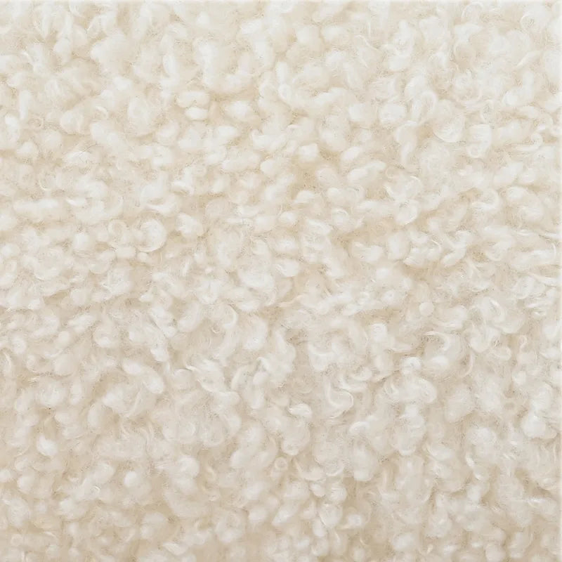Fauteuil rembourré en bouclette