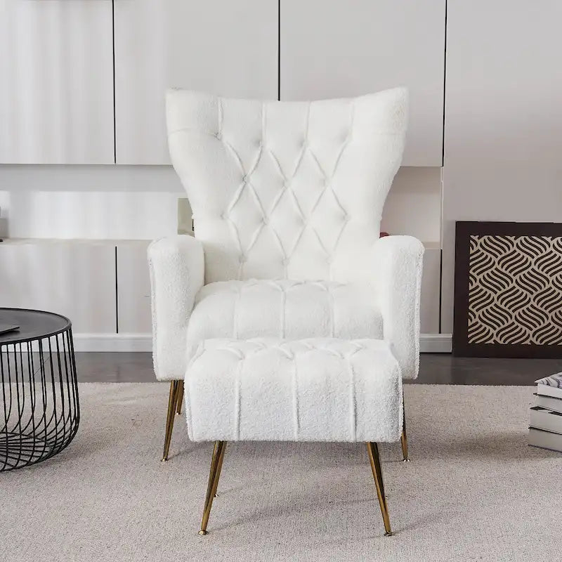 Fauteuil à oreilles tapissé avec pouf