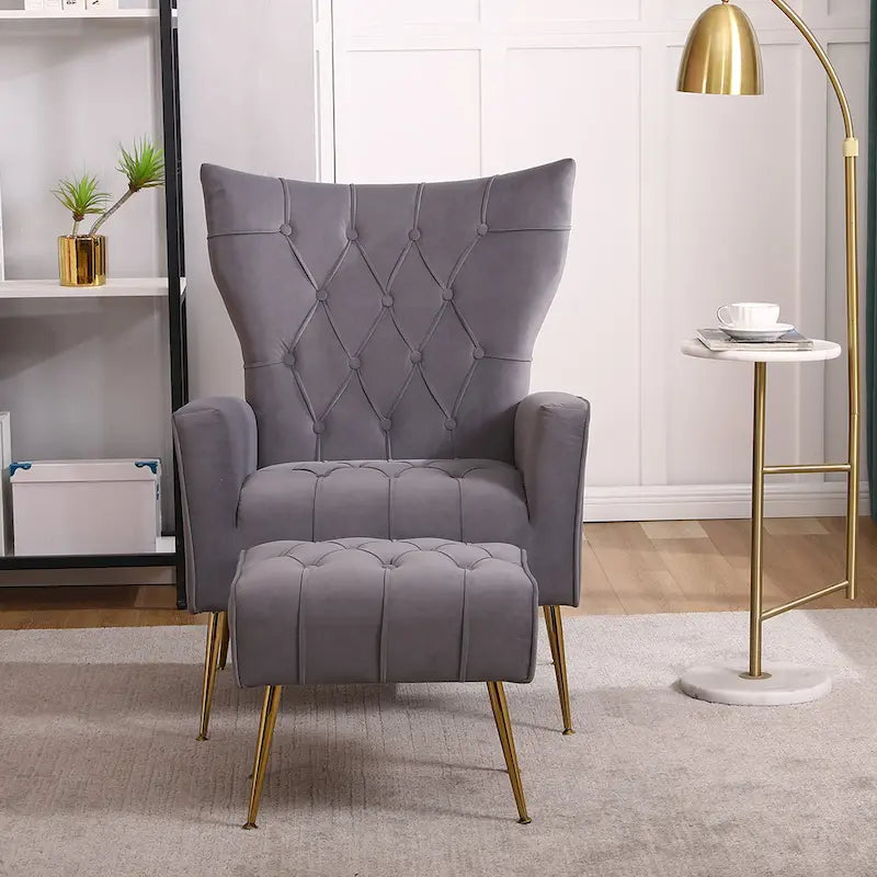 Fauteuil à oreilles tapissé avec pouf