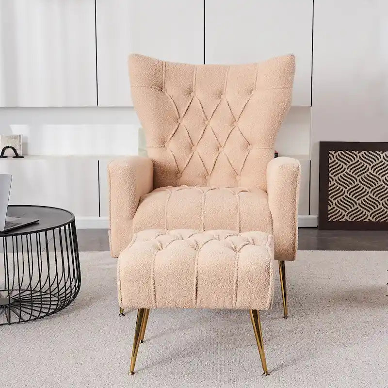 Fauteuil à oreilles tapissé avec pouf