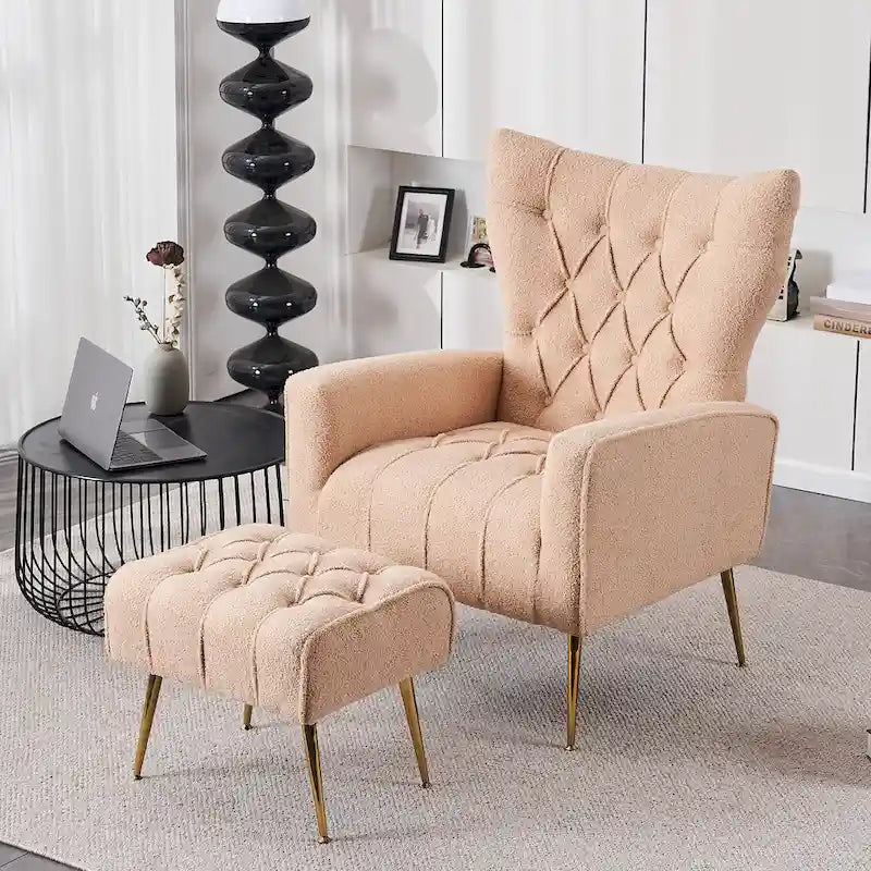 Fauteuil à oreilles tapissé avec pouf