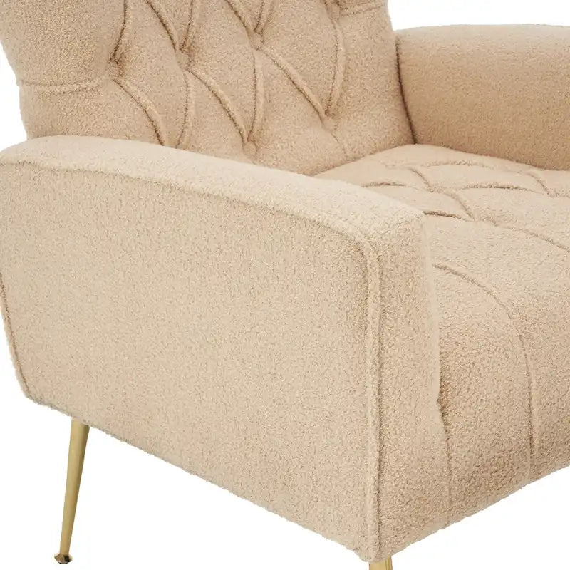 Fauteuil à oreilles tapissé avec pouf